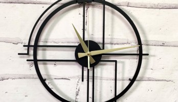 Çizgisel Modern Yuvarlak Lazer Kesim Metal Duvar Saati